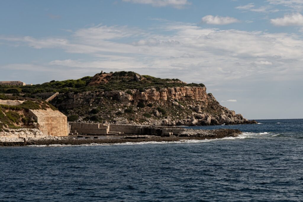 Rocky coastline with blue ocean travel destination